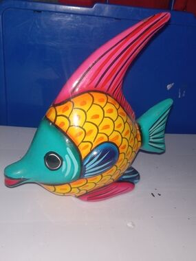 hand-painted ceramic fish figurine of Mexican folk art origin.